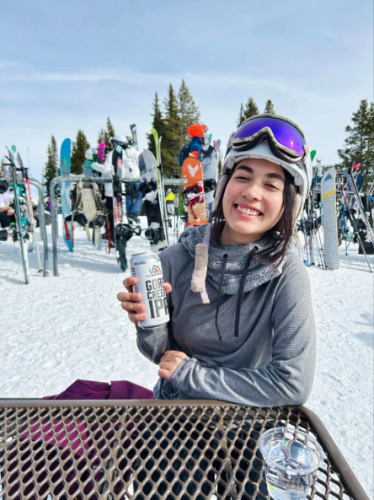 Travel Lemming Editor Abigail Bliss, posing with her drink for après-ski