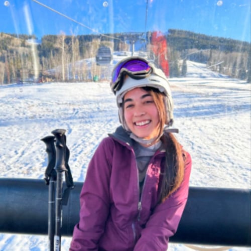 Abigail Bliss riding a Gondola in Colorado