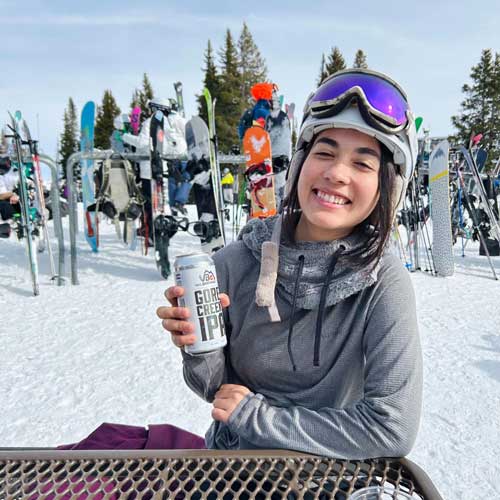 Abigail Bliss enjoying her canned drink during winter season