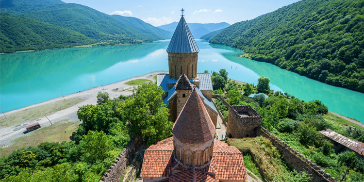 Aerial view of the Ananuri Castle surrounded by the water and mountain views