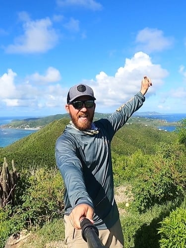 Andrew Bloem holding his selfie stick in Andrew Bloem