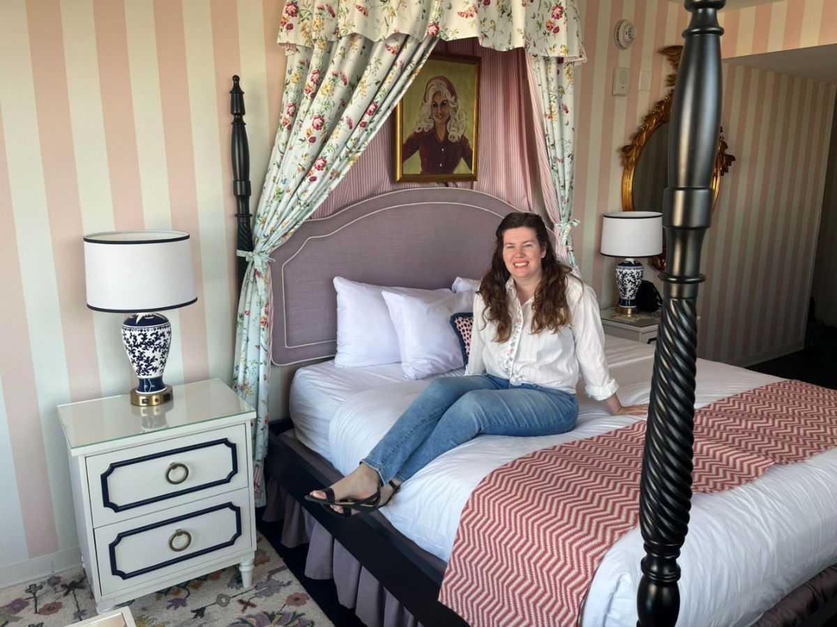 Author Elizabeth Demolat posing in a room at Graduate Nashville