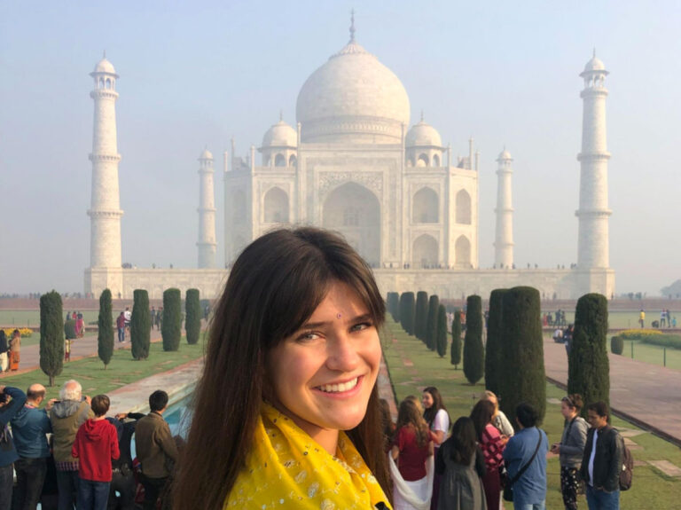 Author Betty with the Taj Mahal in the background