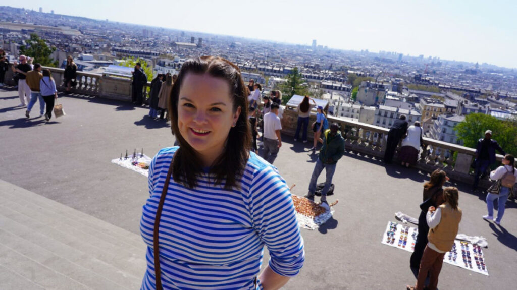 Author Rachel standing at Sacré Coeur Basilica