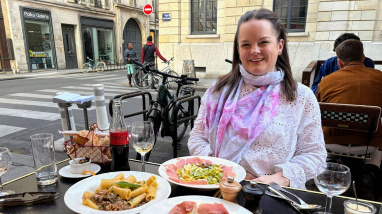 Author Rachel dining al fresco at Le Petit Italien