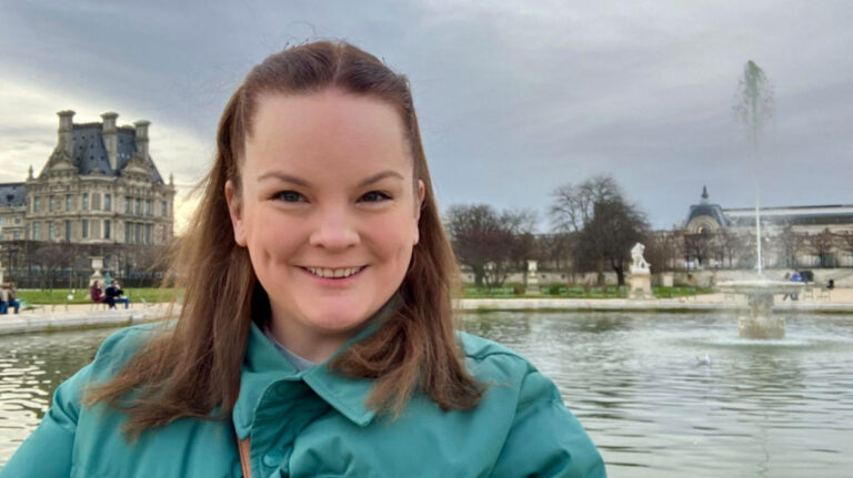Author Rachel taking a photo in the 1st arrondissement