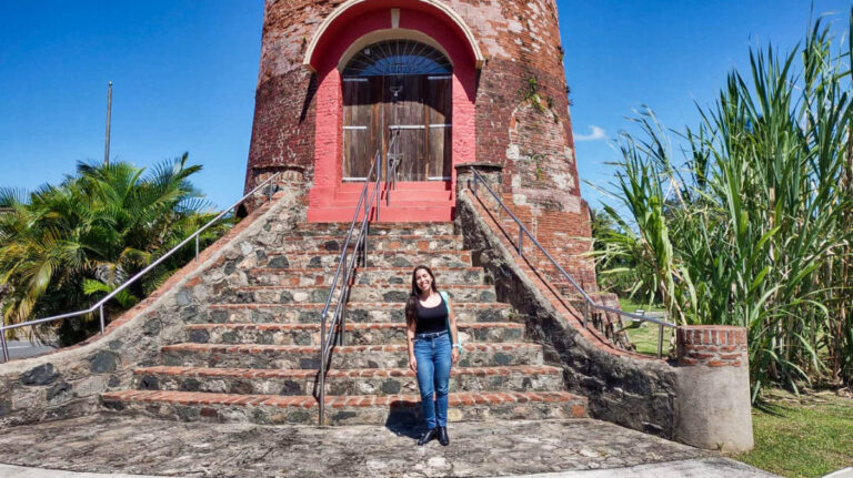 The author Vanessa Ramos, posing outside the Ron del Barrilito