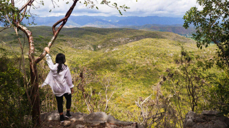 The author Vanessa Ramos, admiring the view from El Vigía trail at Guanica Dry Forest