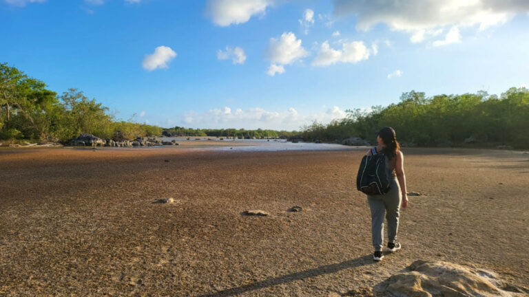 Author Vanessa walking along the Survival Beach Trail in Aguadilla