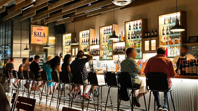 View of the people dining and drinking at the bar area of Sala Astoria