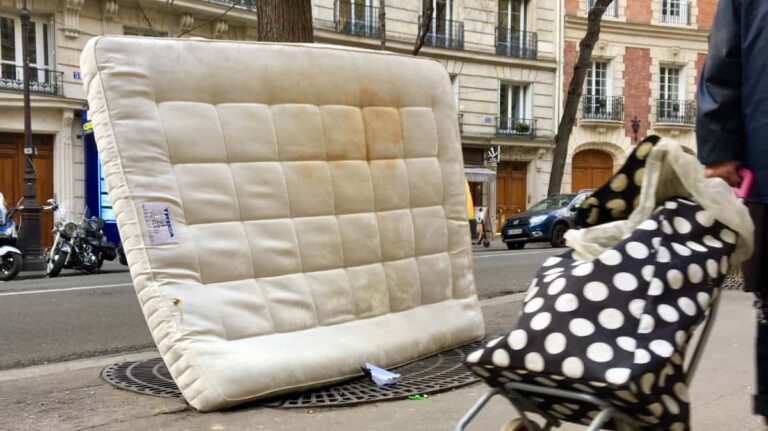 A bed infested with bedbugs