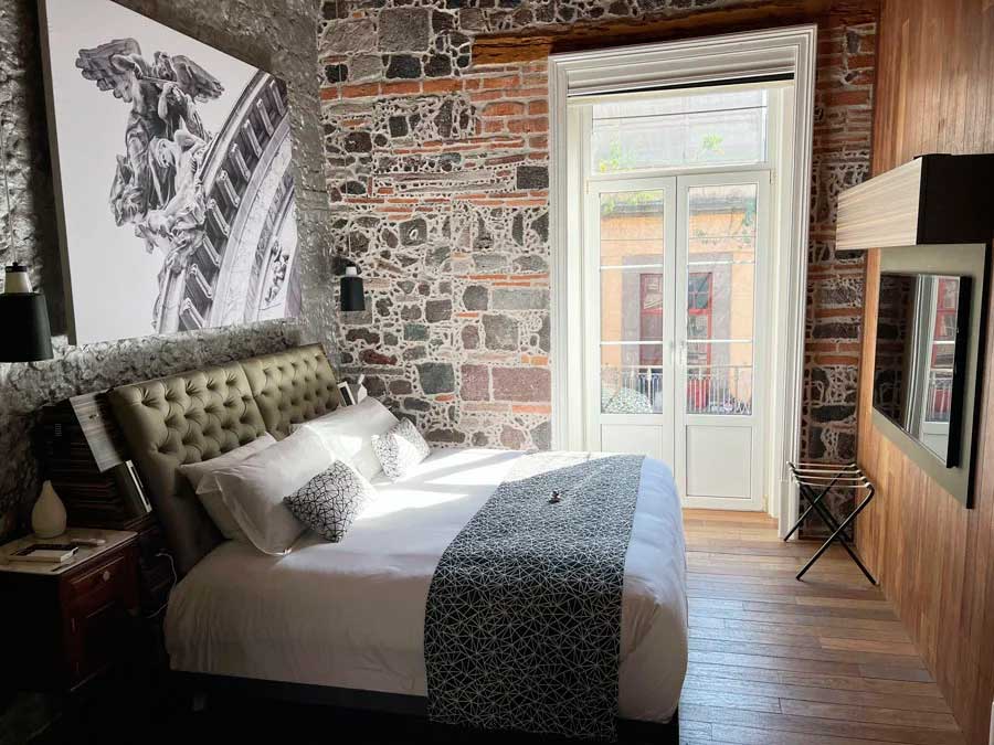 View of the bedroom interior in Mumedi Design Hotel