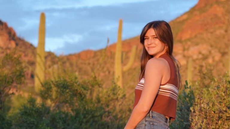 The author Betty Hurd with cacti on her background