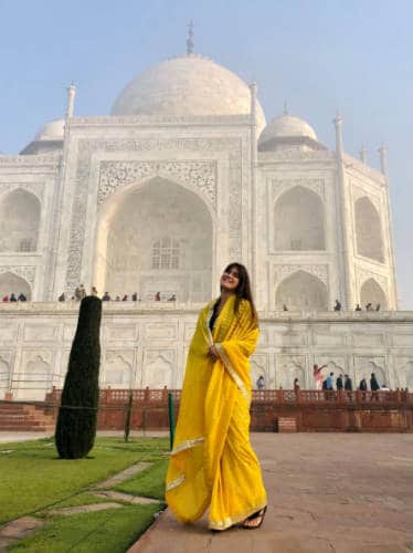 Betty Hurd posing for a photo at the Taj Mahal