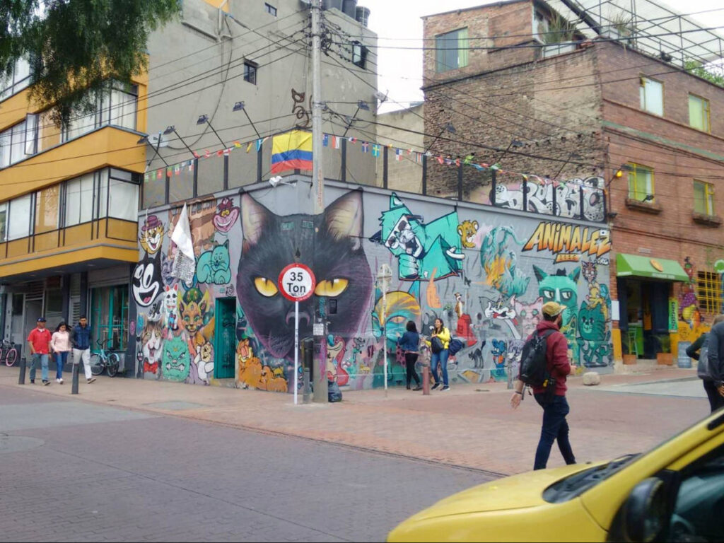 A corner building with graffiti around in Bogotá