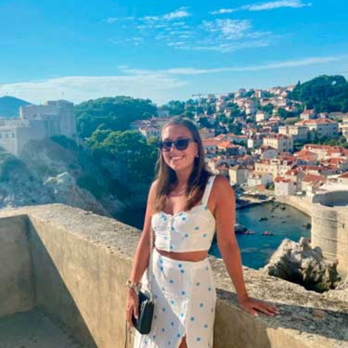 Brooke Horrobin with an overlooking view of Dubrovnik Croatia in her background