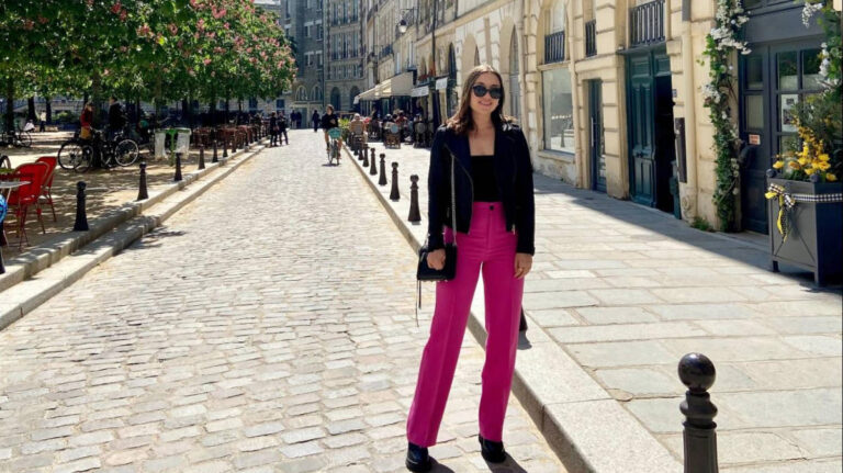 The author, Brooke Horrobin posing for a photo on a street in Paris