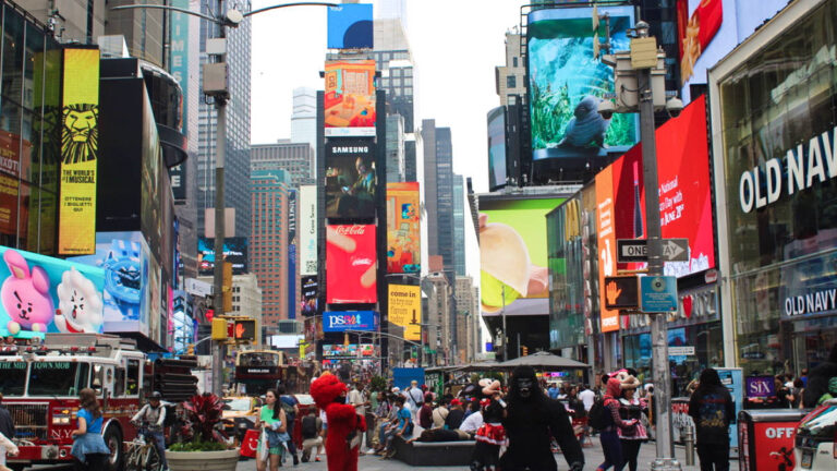 View of the colorful LED screens and bustling New York City