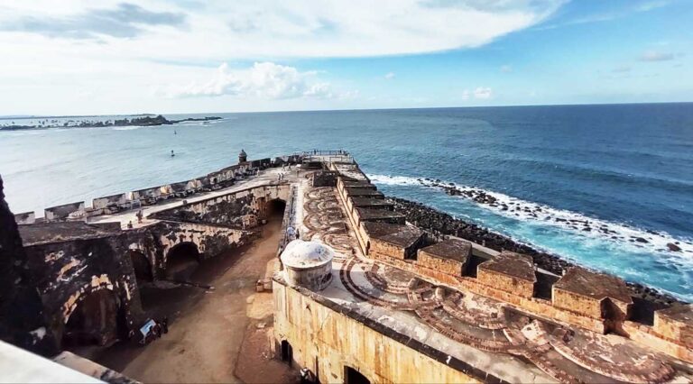 View of the blue water and clear blue sky from El Morro