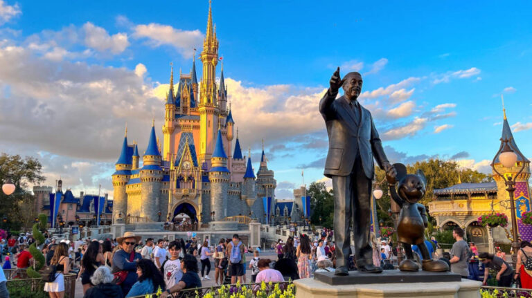 Walt Disney and Mickey Mouse statue, with the Cinderella Castle on the background