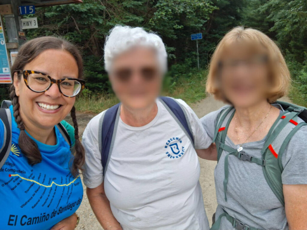The author Catherine Driver and her Camino friends smiling for a photo