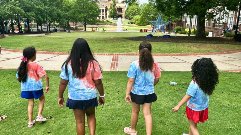 The author's daughter with her cousins at the park