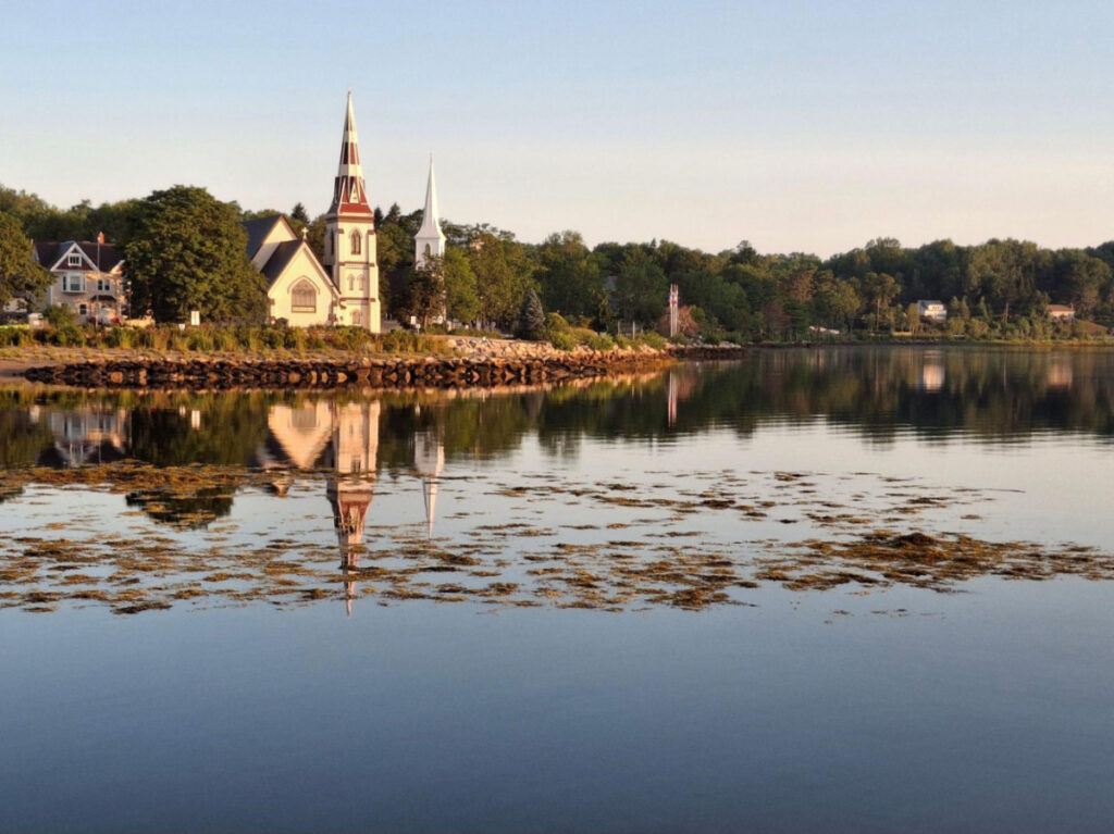 Scenic view of the church reflecting in the water early in the morning