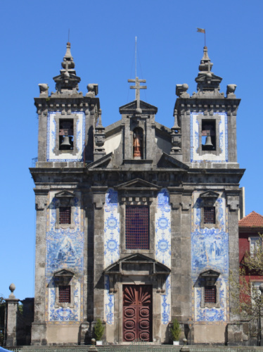 View of the blue-tiled exterior of Church of Saint Ildefonso