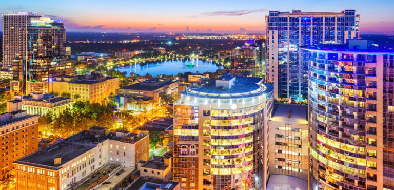 Aerial cityscape view towards Eola Lake
