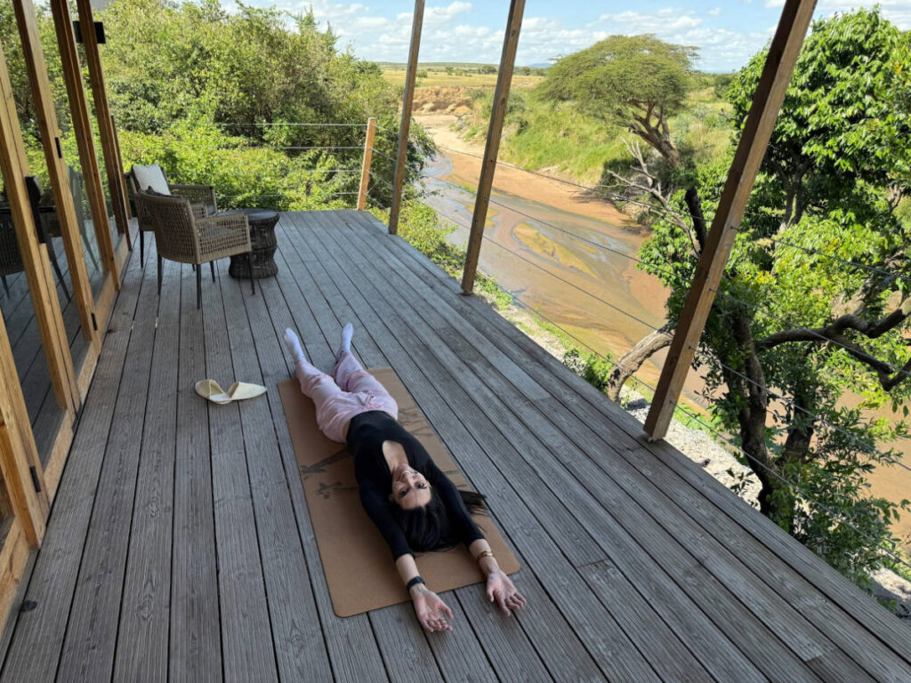 Travel Lemming writer Clara Kesseler, doing yoga at the deck