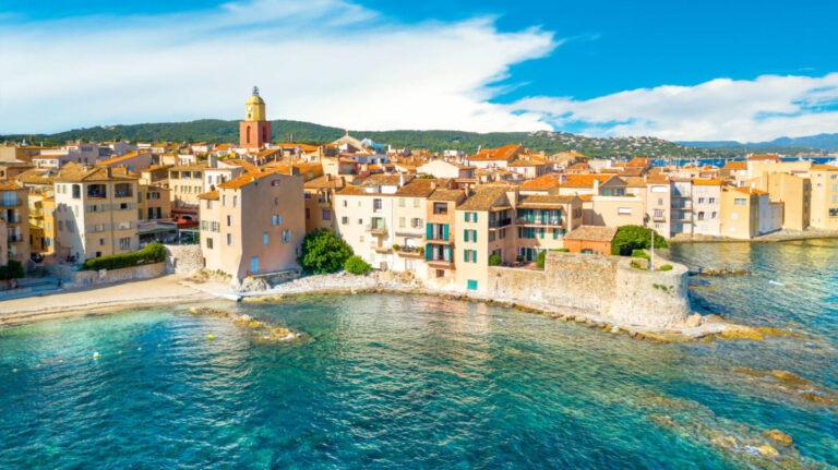 Aerial view of the city of Saint-Tropez along the coastline in Cote d'Azur