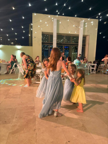 Kids dancing on Hyatt Ziva's rooftop