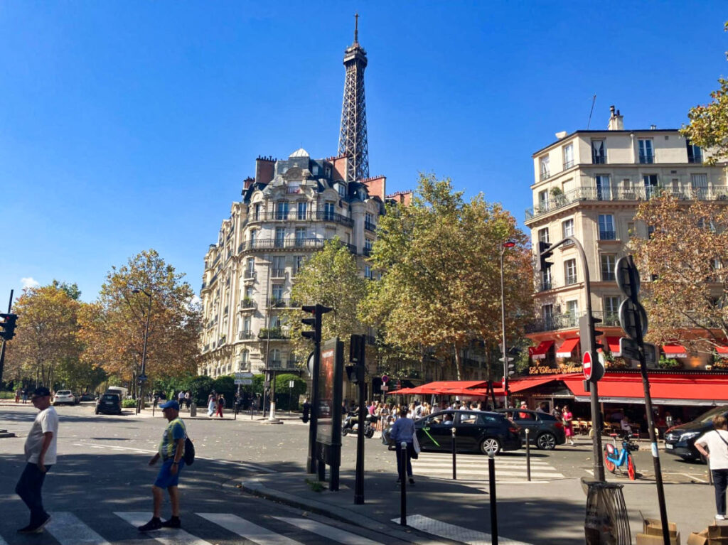 view of the Eiffel Tower from the street in Gros-Caillou