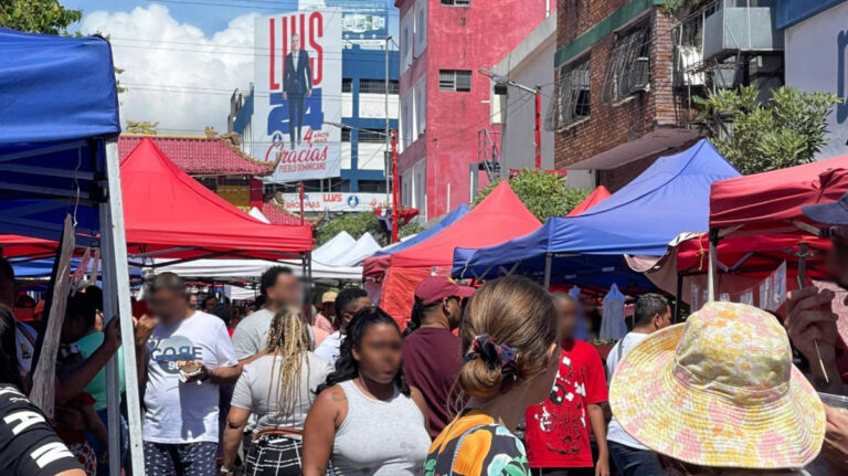 View of people at the street market in El Barrio Chino