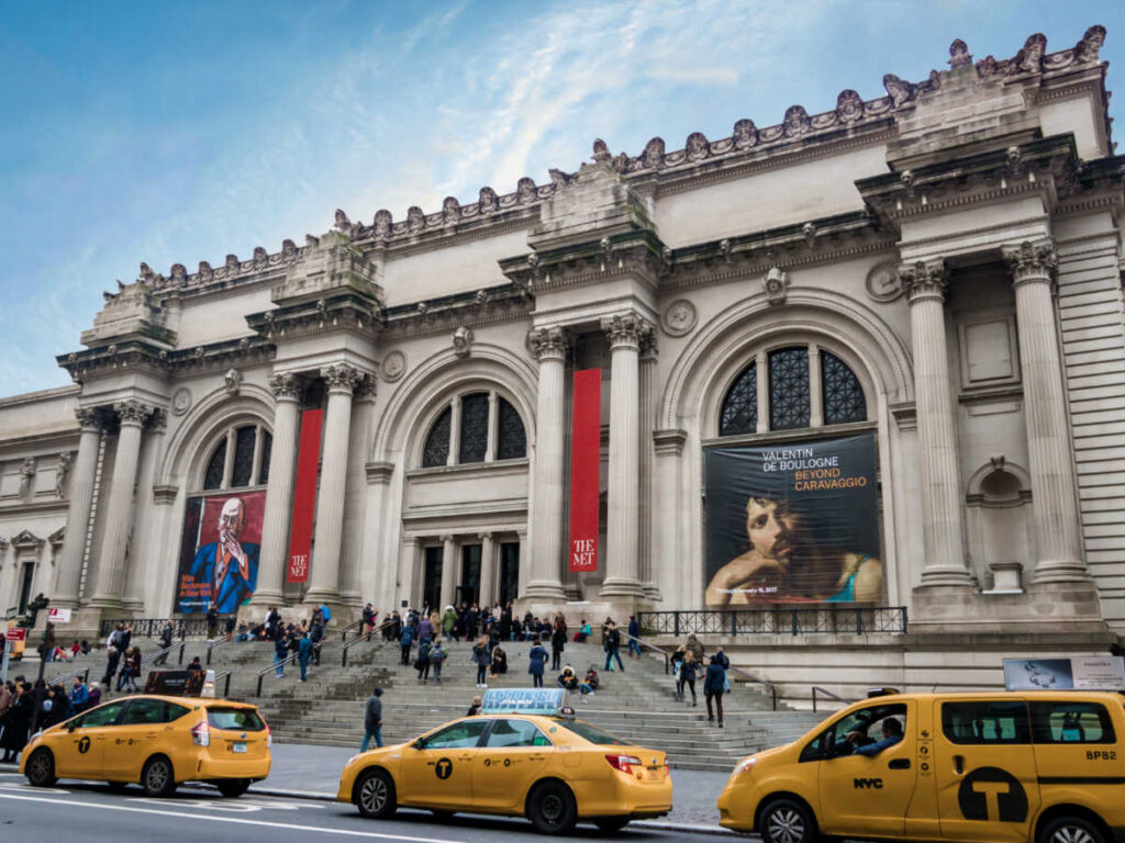 View of the exterior and the crowd outside the Metropolitan Museum of Art