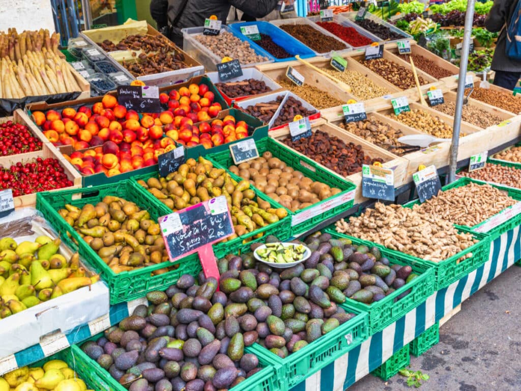 View of the displayed variety of fresh produce in Marché d'Aligré