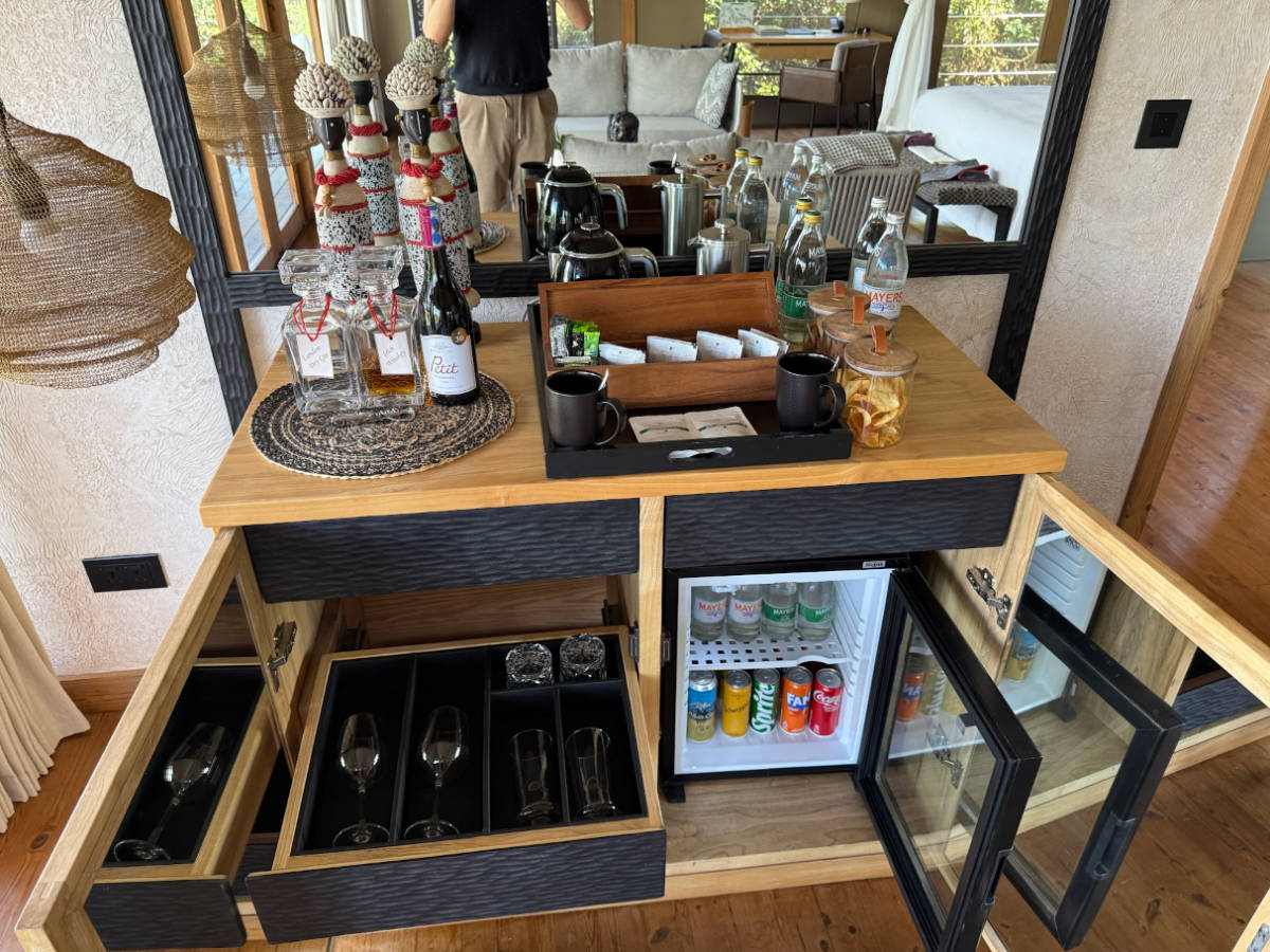 View of the fully stocked minibar inside the room