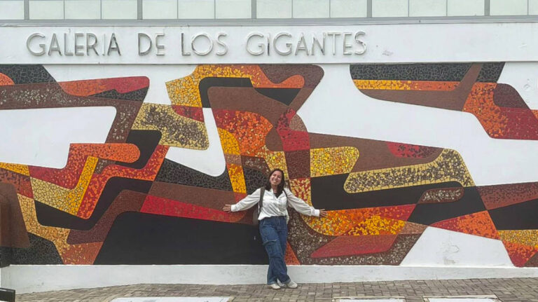 The author Vanessa Ramos standing outside of Galería de los Gigantes