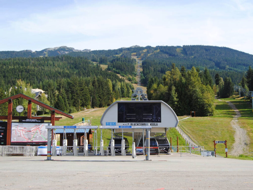 View of the gondola ride with scenic mountain views behind