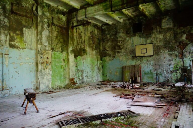 An abandoned basketball court inside a derelict building in Pripyat