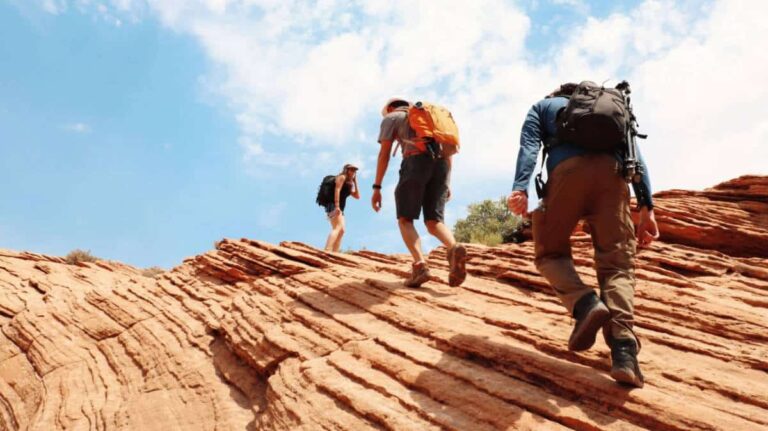 The author, Betty Hurd with her friends ascend a rocky trail