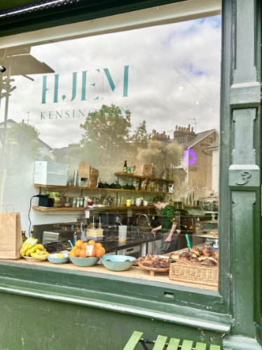 View of the big window storefront of Hjem in South Kensington