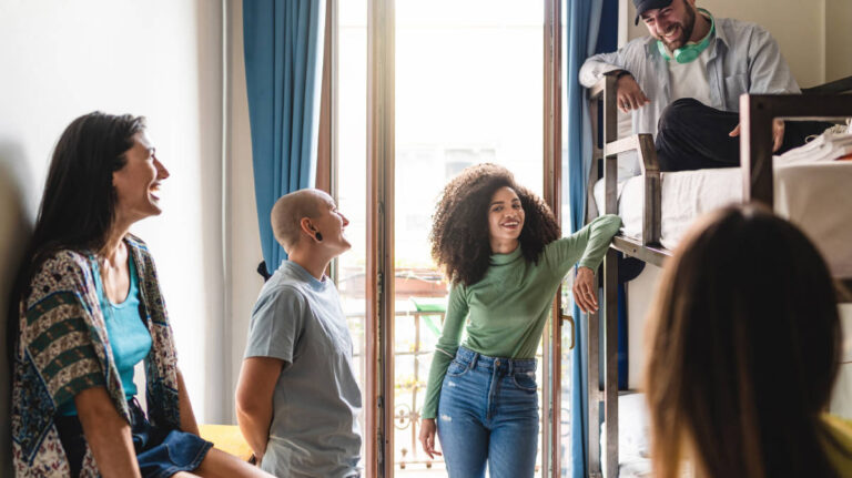 Hostel guests having a great conversation inside the room