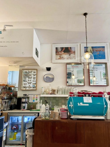 View of the cozy interior at the counter of St Clements in Fulham