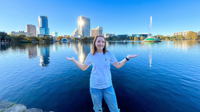 The author Katie Neufeld posing for a photo at Lake Eola