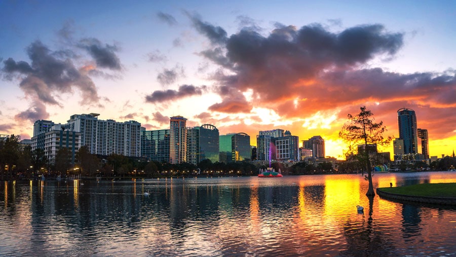 View of the Lake Eola and skycrapers in Downtown Orlando during sunset