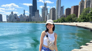 The author Lea Rose Allbaugh smiling for a photo in Chicago