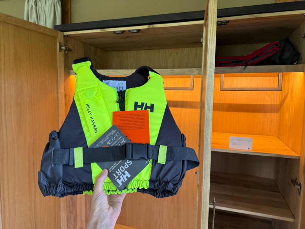 A life jacket in the cabinets of the room