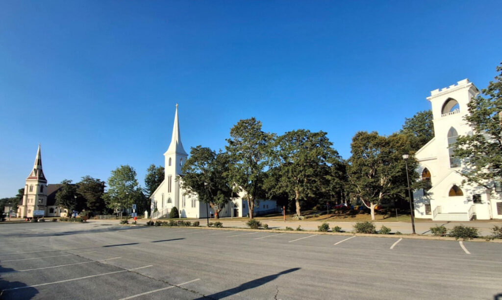 View of the lined famous “Three Churches” in Mahone Bay