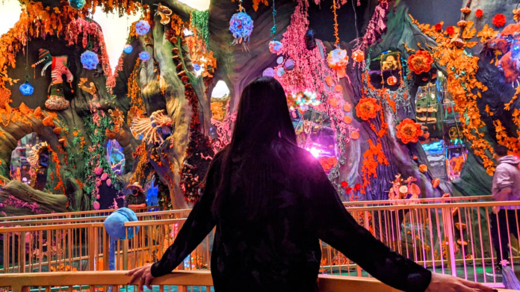 Travel Lemming creator Clara Kessler, looking the colorful exhibition at Denver’s Convergence Station